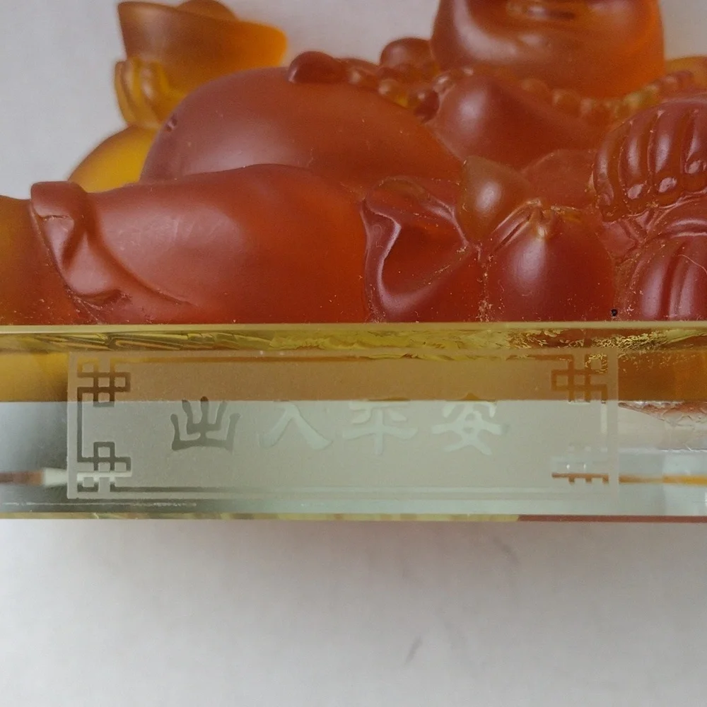 Orange Buddha Figurine